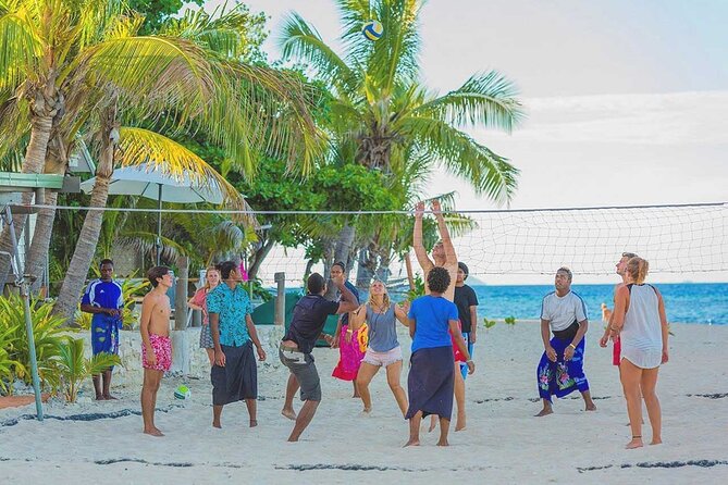 Beachcomber Island Escape - A Perfect Day in Paradise - Coconut scraping and tree climbing