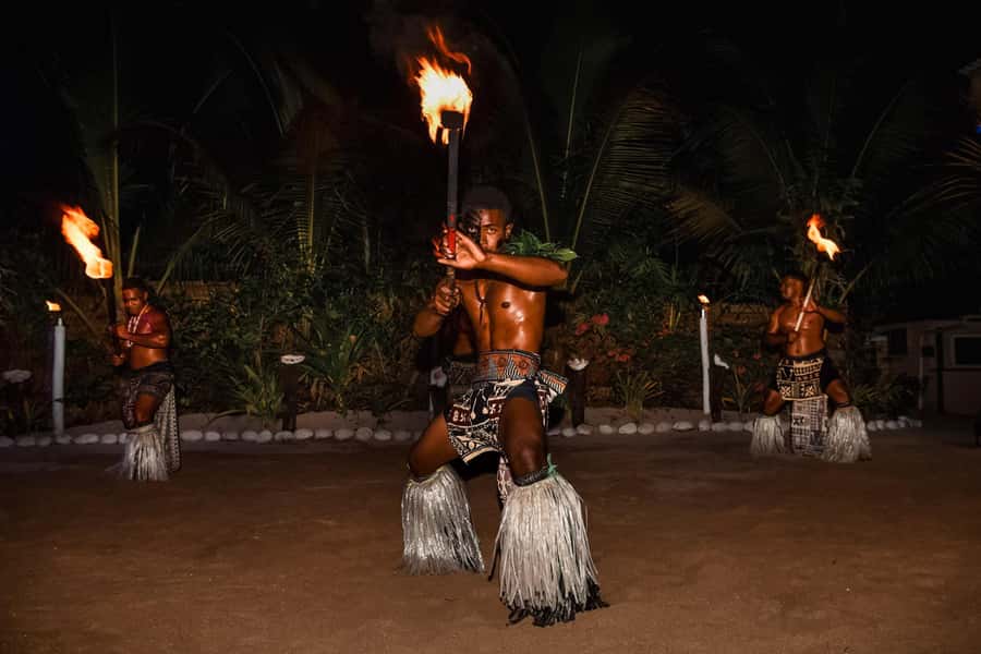 Fiji: Sunset Cruise with Dinner and Fire Show - Opening the lovo oven for dinner